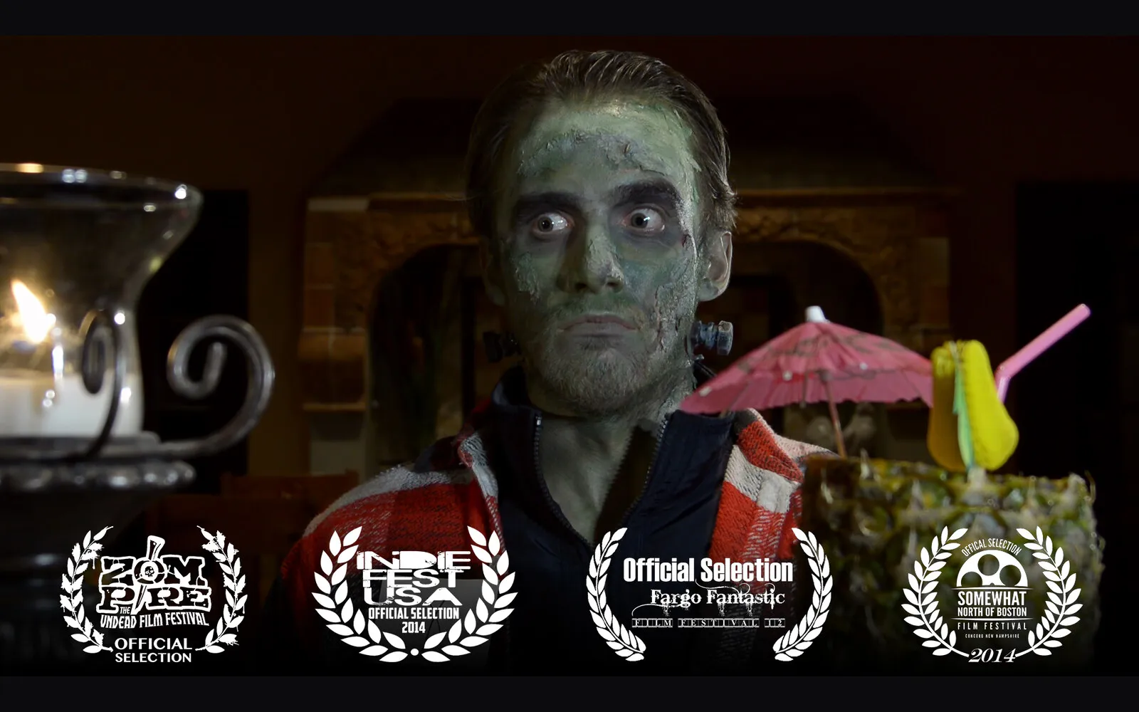 Monster Mash – a film still of the lead character, with four festival laurels